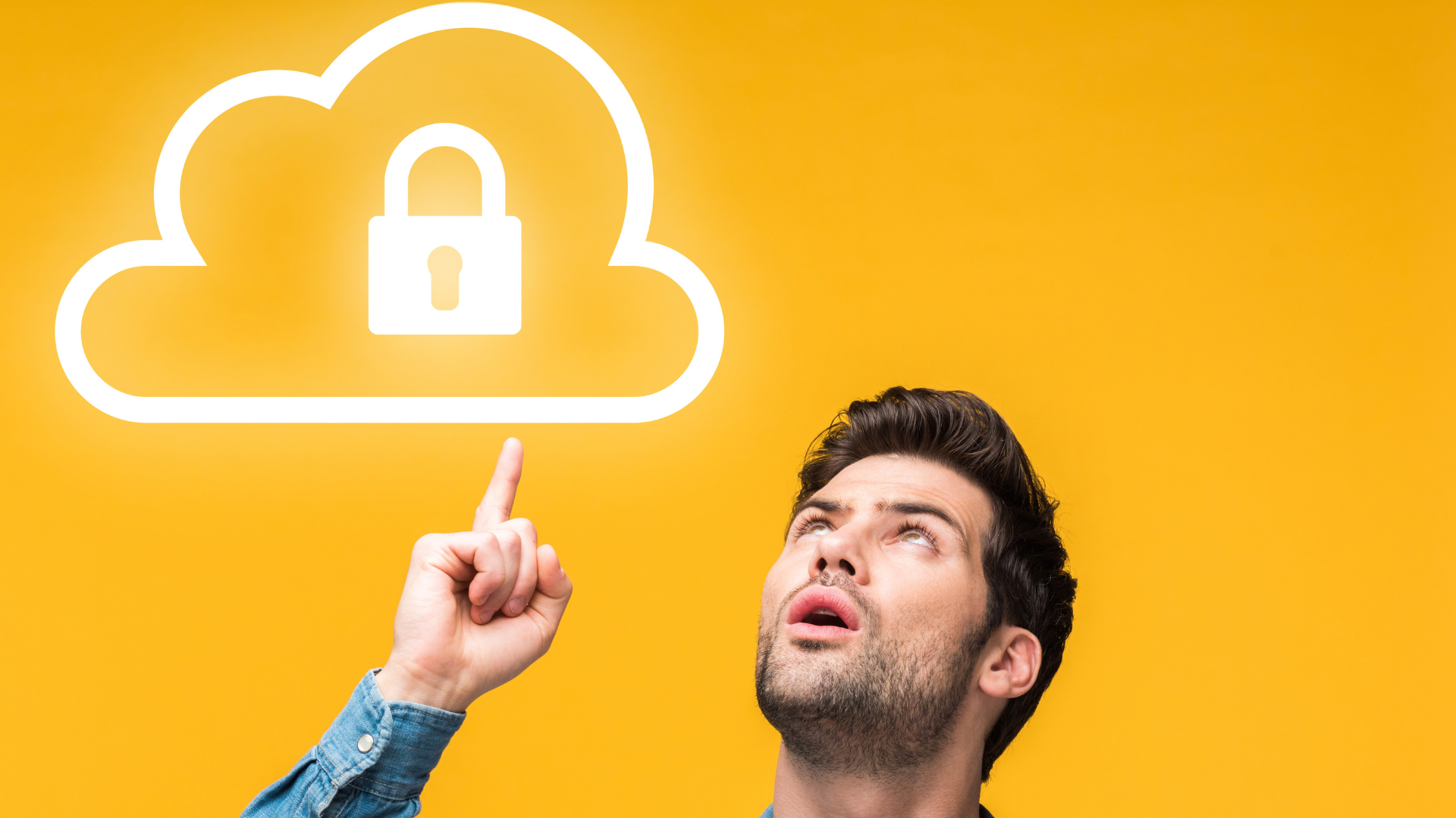 man looking at icon of cloud lock and key