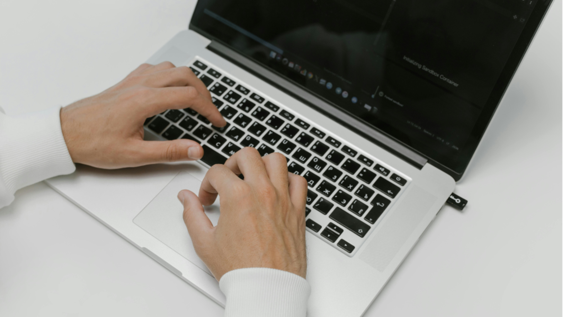 hands laying on a keyboard