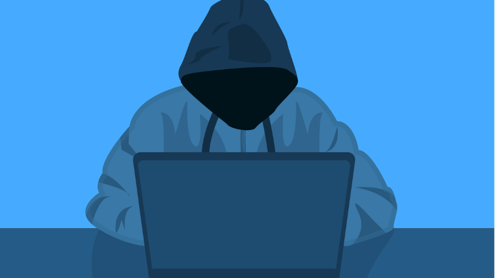 no faced hacker sitting behind a laptop